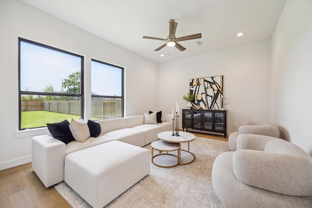 403 Venado View Ct, Conroe, TX 77304 - living room featuring wood finished floors, plenty of natural light, ceiling fan, recessed lighting, and baseboards