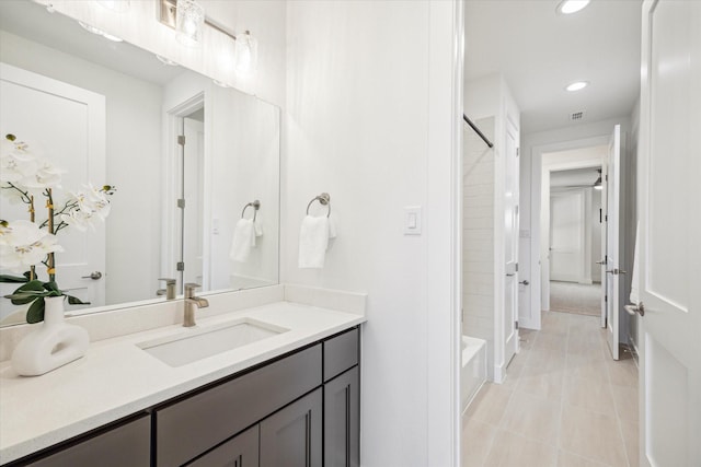 403 Venado View Ct, Conroe, TX 77304 - bathroom with tile patterned flooring, recessed lighting, vanity, and shower / tub combination