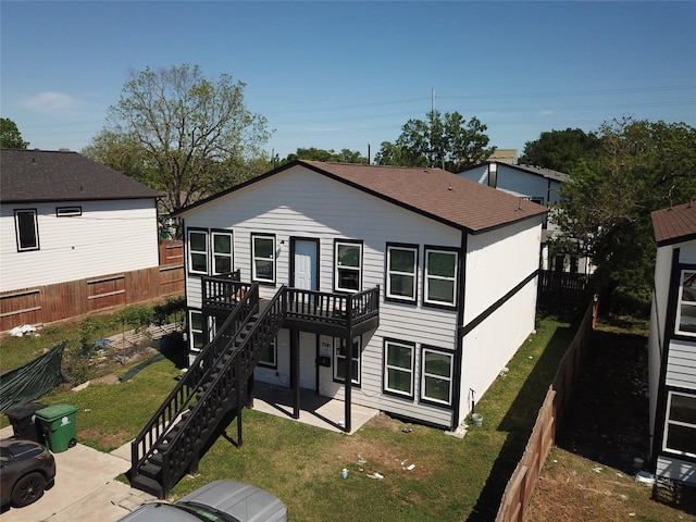 3541 Mount Pleasant St, Houston, TX 77021 - back of property with a patio area, a deck, and stairway