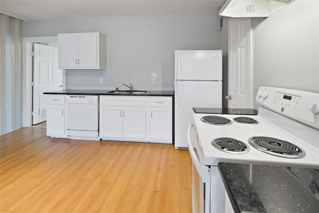 3541 Mount Pleasant St, Houston, TX 77021 - kitchen with white appliances, a sink, white cabinetry, and light wood-style flooring