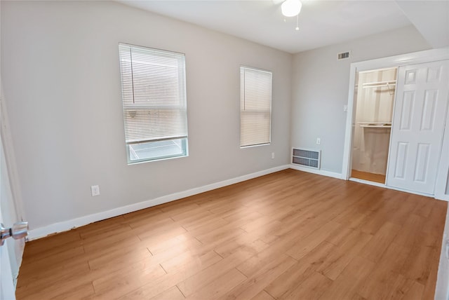 3541 Mount Pleasant St, Houston, TX 77021 - unfurnished bedroom with light wood-style flooring, a closet, and baseboards