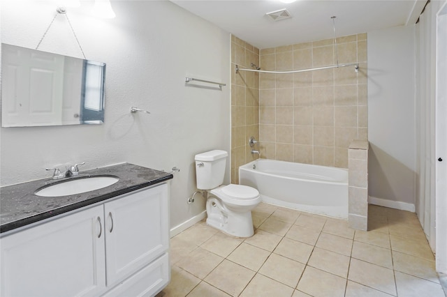 3541 Mount Pleasant St, Houston, TX 77021 - full bathroom with tile patterned flooring, baseboards, toilet, vanity, and shower / washtub combination