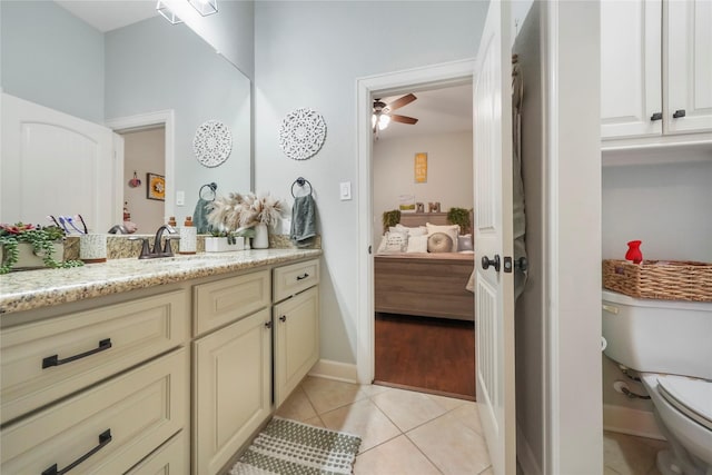 26122 Crown Ranch Blvd, Montgomery, TX 77316 - bathroom featuring toilet, ensuite bath, ceiling fan, vanity, and tile patterned flooring