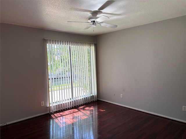 2822 S Bartell Dr Unit 22, Houston, TX 77054 - spare room featuring wood finished floors, a ceiling fan, a textured ceiling, and baseboards