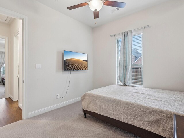 27419 Haywood Ln, Katy, TX 77494 - carpeted bedroom with baseboards and a ceiling fan