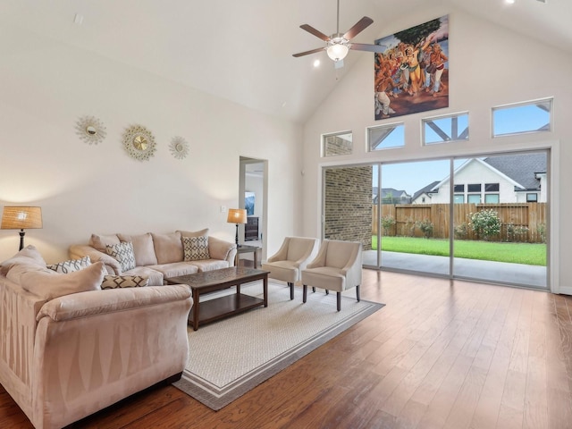 27419 Haywood Ln, Katy, TX 77494 - living room with high vaulted ceiling, a ceiling fan, and wood finished floors