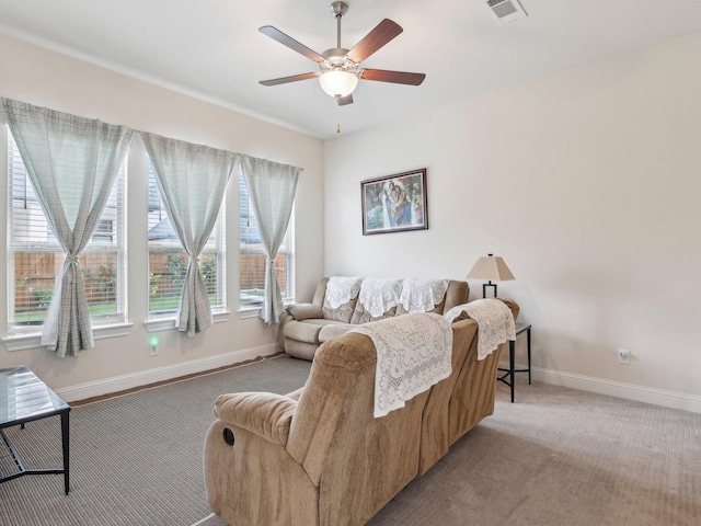 27419 Haywood Ln, Katy, TX 77494 - living room featuring light colored carpet, baseboards, and a ceiling fan