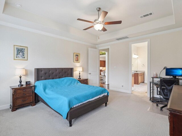 27419 Haywood Ln, Katy, TX 77494 - bedroom with a raised ceiling, light carpet, and a desk