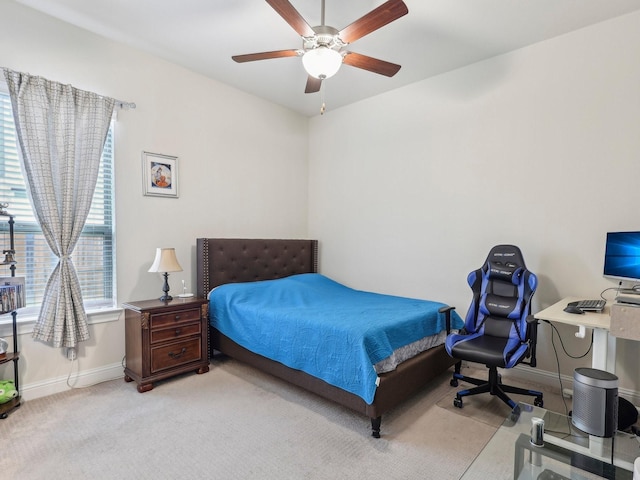27419 Haywood Ln, Katy, TX 77494 - carpeted bedroom with baseboards and ceiling fan