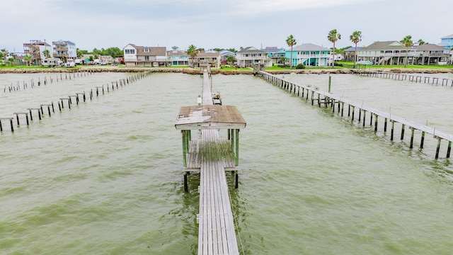 1417 8th St, San Leon, TX 77539 - dock featuring a residential view and a water view