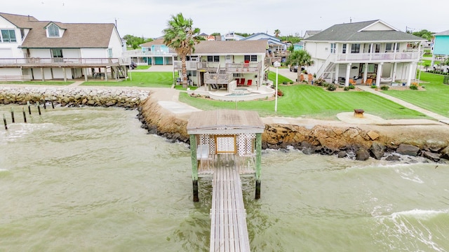 1417 8th St, San Leon, TX 77539 - dock area featuring stairs, a water view, a lawn, and a residential view