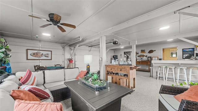 1417 8th St, San Leon, TX 77539 - living room featuring speckle patterned floor and a ceiling fan