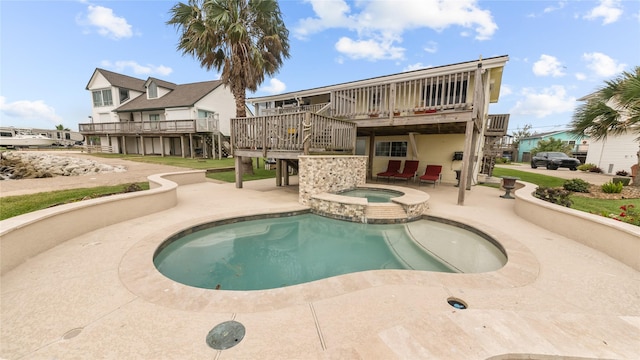 1417 8th St, San Leon, TX 77539 - view of pool with a patio, a deck, stairs, and a pool with connected hot tub