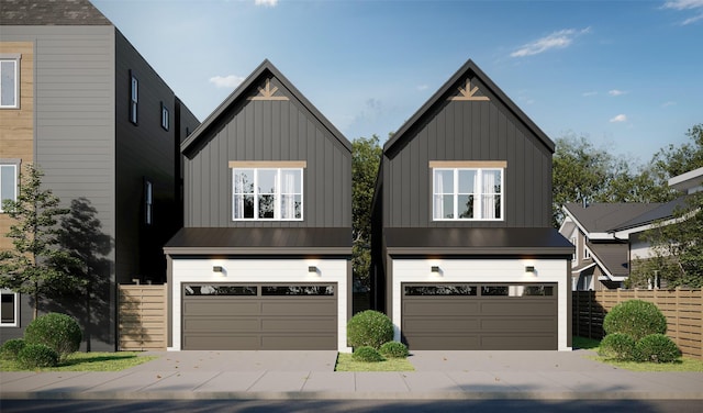 6705 Del Rio St, Houston, TX 77021 - view of front of house featuring board and batten siding, a garage, and driveway
