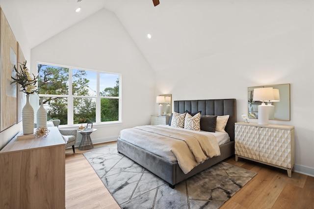 6705 Del Rio St, Houston, TX 77021 - bedroom featuring high vaulted ceiling, wood finished floors, baseboards, recessed lighting, and a ceiling fan