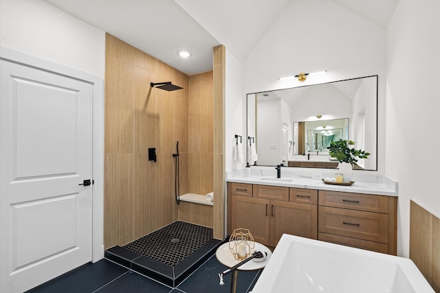 6705 Del Rio St, Houston, TX 77021 - bathroom with walk in shower, vanity, a freestanding bath, lofted ceiling, and recessed lighting
