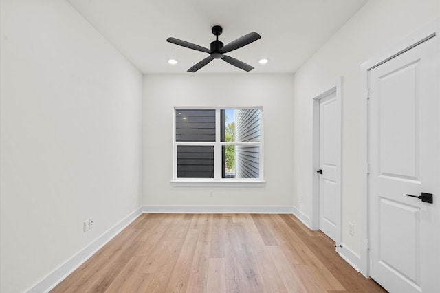 6705 Del Rio St, Houston, TX 77021 - unfurnished bedroom featuring light wood-type flooring, baseboards, recessed lighting, and ceiling fan