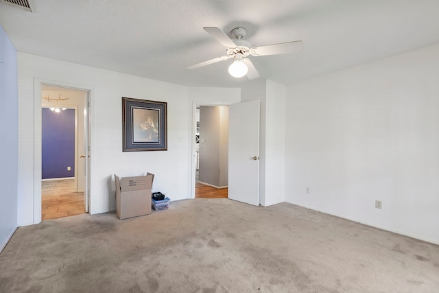 9219 Sendera Dr, Magnolia, TX 77354 - unfurnished bedroom featuring carpet floors, ceiling fan, and baseboards