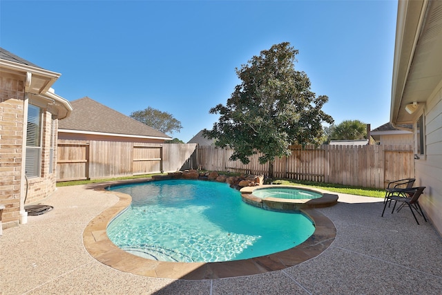 15106 Aragon Green Dr, Cypress, TX 77433 - view of pool featuring a fenced backyard, a pool with connected hot tub, and a patio