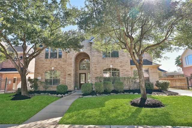 15106 Aragon Green Dr, Cypress, TX 77433 - view of front of property with brick siding and a gate