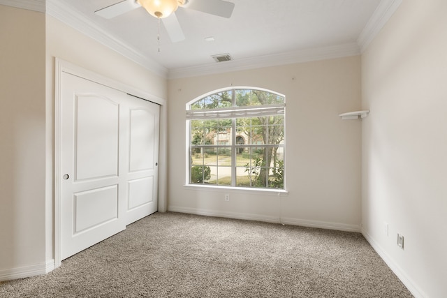 15106 Aragon Green Dr, Cypress, TX 77433 - unfurnished bedroom featuring carpet floors, crown molding, a ceiling fan, baseboards, and a closet