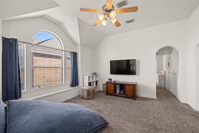 15106 Aragon Green Dr, Cypress, TX 77433 - bedroom with carpet floors, arched walkways, vaulted ceiling, a ceiling fan, and baseboards