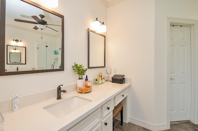 320 Eagle Cv, Hempstead, TX 77445 - bathroom featuring ornamental molding, a ceiling fan, vanity, a shower with door, and tile patterned floors