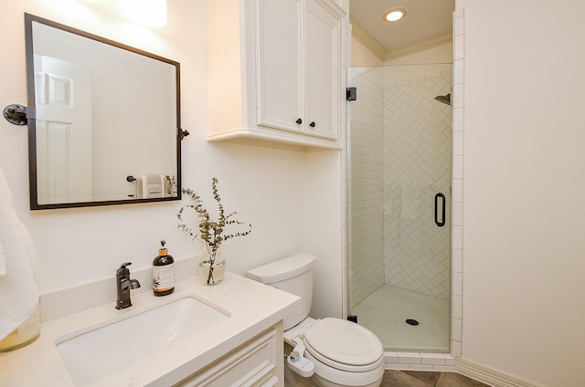 320 Eagle Cv, Hempstead, TX 77445 - bathroom featuring vanity, toilet, a stall shower, crown molding, and recessed lighting