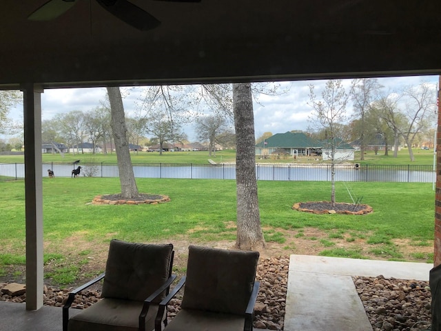 320 Eagle Cv, Hempstead, TX 77445 - view of yard with a water view and a ceiling fan