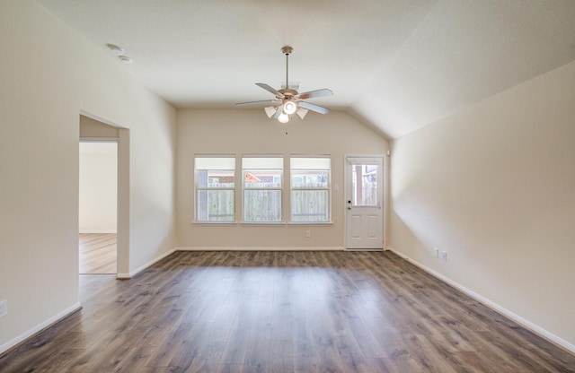 20615 Footstep Path, Katy, TX 77449 - unfurnished room featuring ceiling fan, healthy amount of natural light, dark wood-style flooring, vaulted ceiling, and baseboards