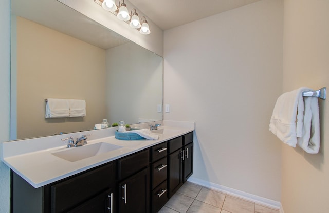 20615 Footstep Path, Katy, TX 77449 - bathroom with tile patterned flooring, double vanity, and baseboards