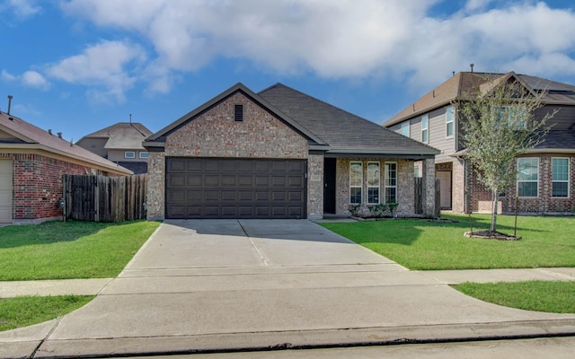 20615 Footstep Path, Katy, TX 77449 - view of front facade with brick siding, concrete driveway, an attached garage, and roof with shingles
