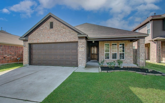20615 Footstep Path, Katy, TX 77449 - view of front of home with an attached garage, concrete driveway, brick siding, and a front lawn