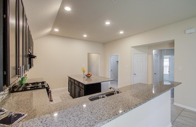 20615 Footstep Path, Katy, TX 77449 - kitchen featuring a sink, recessed lighting, baseboards, light tile patterned floors, and light stone counters