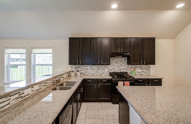 20615 Footstep Path, Katy, TX 77449 - kitchen with black appliances, a sink, decorative backsplash, light stone counters, and under cabinet range hood