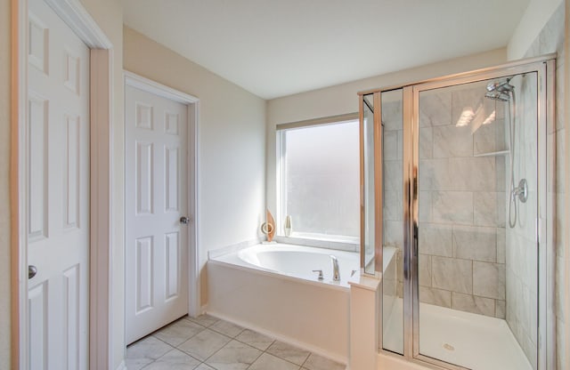 20615 Footstep Path, Katy, TX 77449 - full bath featuring a shower stall, a garden tub, and tile patterned floors
