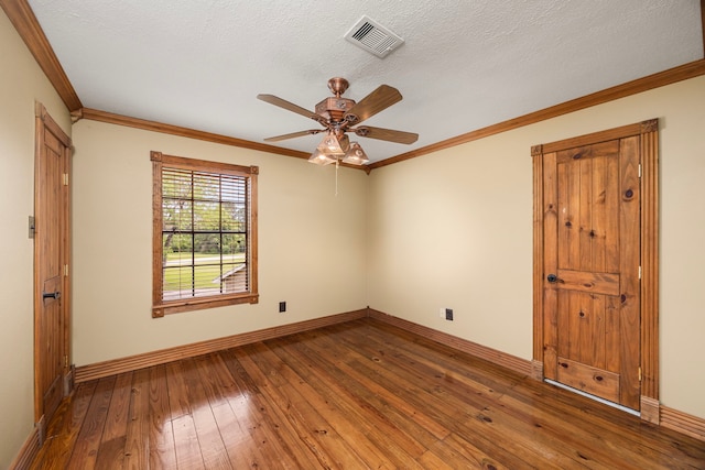 13415 Bayonne Cir, Tomball, TX 77377 - unfurnished room featuring hardwood / wood-style flooring, a ceiling fan, baseboards, ornamental molding, and a textured ceiling