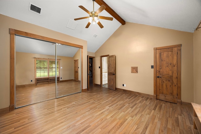13415 Bayonne Cir, Tomball, TX 77377 - unfurnished bedroom with light wood finished floors, beam ceiling, a closet, baseboards, and high vaulted ceiling