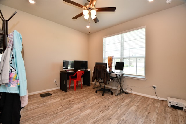 office space featuring a ceiling fan, wood finished floors, baseboards, and recessed lighting