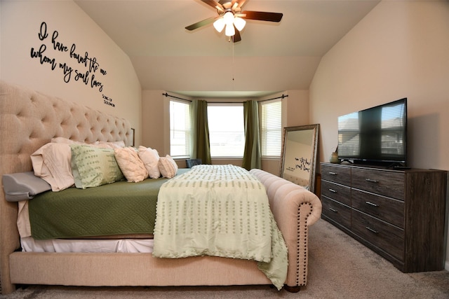 carpeted bedroom with lofted ceiling and a ceiling fan