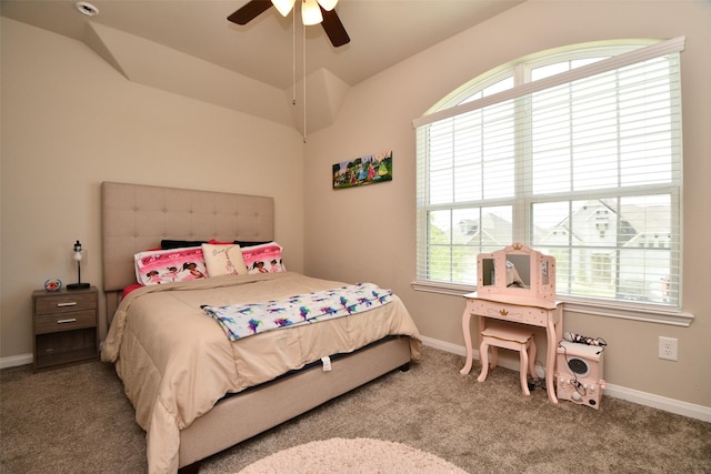 carpeted bedroom featuring multiple windows, baseboards, lofted ceiling, and a ceiling fan
