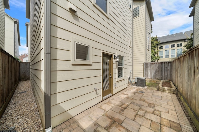 2909 Pease St, Houston, TX 77003 - fenced backyard with a patio area and central AC