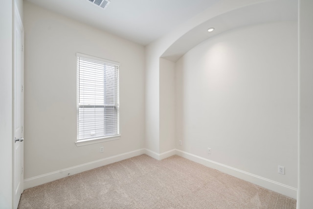 2909 Pease St, Houston, TX 77003 - unfurnished room featuring light carpet and baseboards