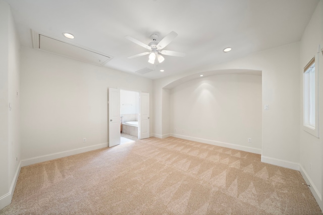 2909 Pease St, Houston, TX 77003 - spare room featuring attic access, light carpet, ceiling fan, recessed lighting, and baseboards