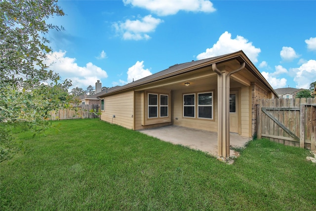 2526 Wood Park Blvd, Conroe, TX 77304 - back of property featuring a patio area