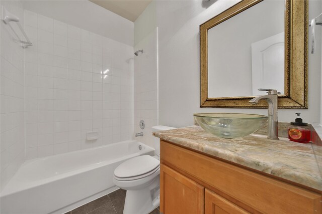 2526 Wood Park Blvd, Conroe, TX 77304 - full bathroom with vanity, shower / bathtub combination, tile patterned flooring, and toilet
