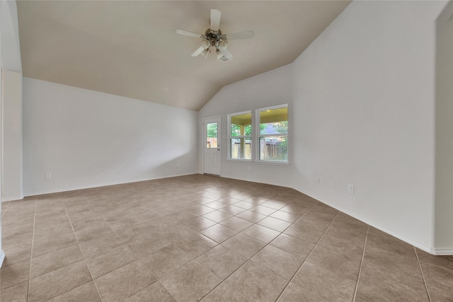 2526 Wood Park Blvd, Conroe, TX 77304 - tiled spare room with ceiling fan, baseboards, and high vaulted ceiling