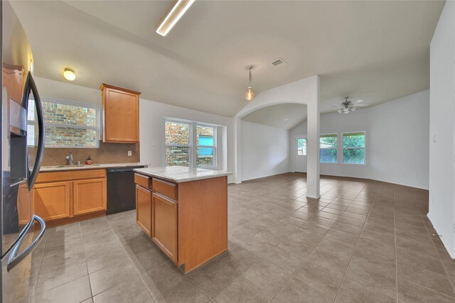 2526 Wood Park Blvd, Conroe, TX 77304 - kitchen featuring lofted ceiling, black dishwasher, a ceiling fan, open floor plan, and refrigerator with ice dispenser