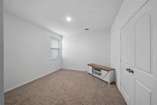 177 Jim Hall Ln, New Waverly, TX 77358 - unfurnished room with light carpet, baseboards, and recessed lighting