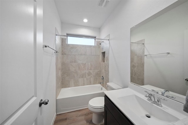177 Jim Hall Ln, New Waverly, TX 77358 - bathroom featuring toilet, wood finished floors, vanity, and bathtub / shower combination